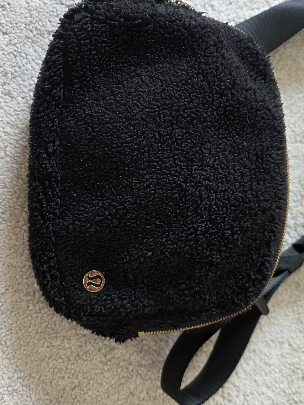 lululemon black mini sherpa backpack with gold zipper